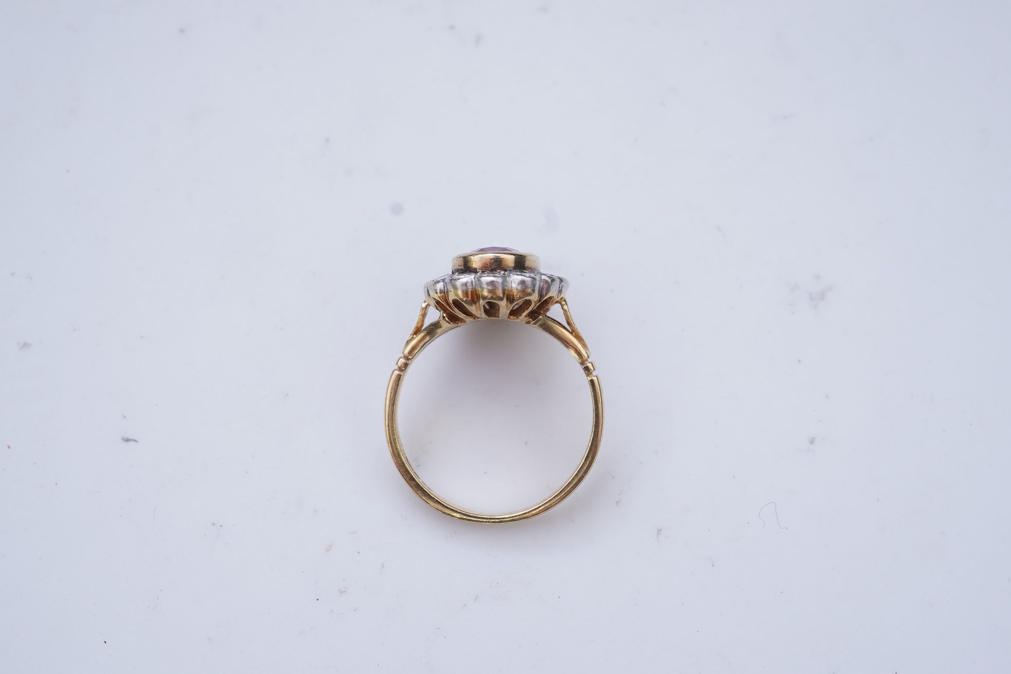 A ruby and diamond cluster ring